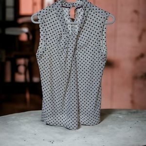 TOMMY HILFIGER Ladies casual top. Black and white poka dot Knot neck top